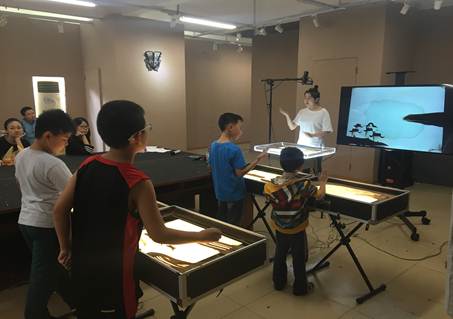 说明: C:\Users\XUYUXIAN\Desktop\5月轮岗文档\学会业界动态上传资料\5.2接收\5.2接收\白云区 4月29、30活动通讯 - 复件(1)\4月29、30活动通讯\沙画伴成长第五期\照片\20170430200415.jpg